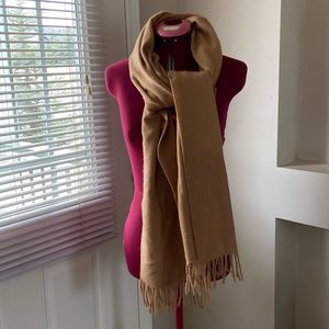 100% Lambswool tan large fringed detailing scarf. Great used condition.
